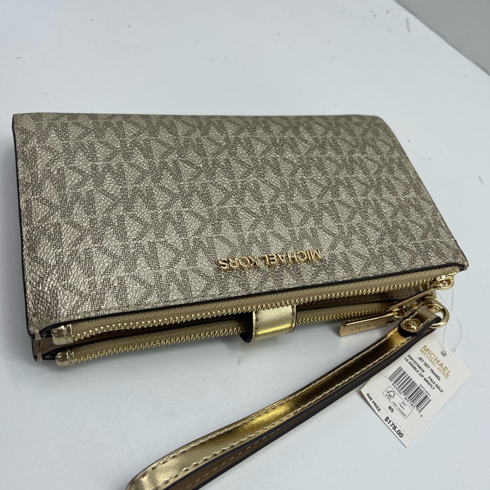 MICHAEL KORS JST Lg Double Zip Signature Logo Wristlet Wallet Phon
Pale Gold
NWT - Picture 13 of 16